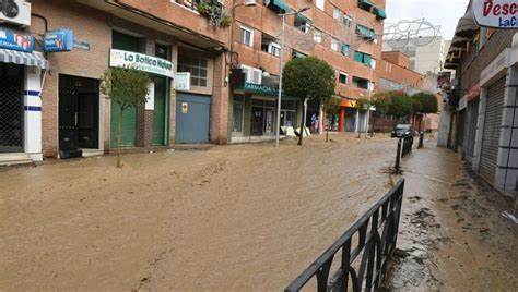 Madrid flooding puts city in lockdown as desperate search underway for ...